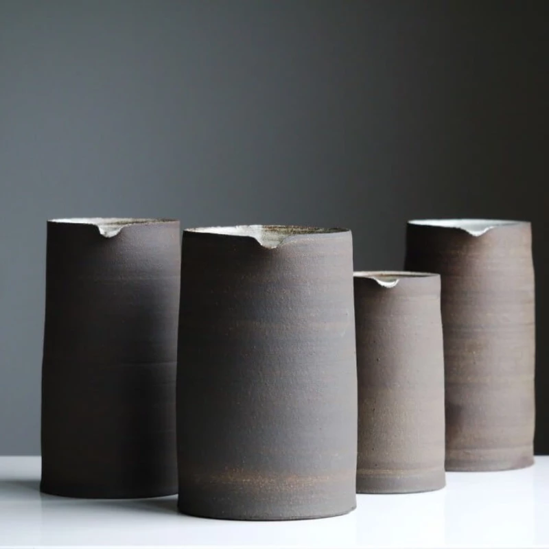 A cute little family of four vases.